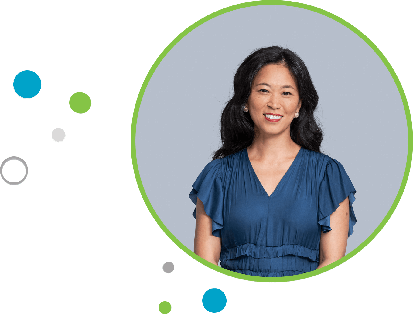 Woman smiling in blue dress