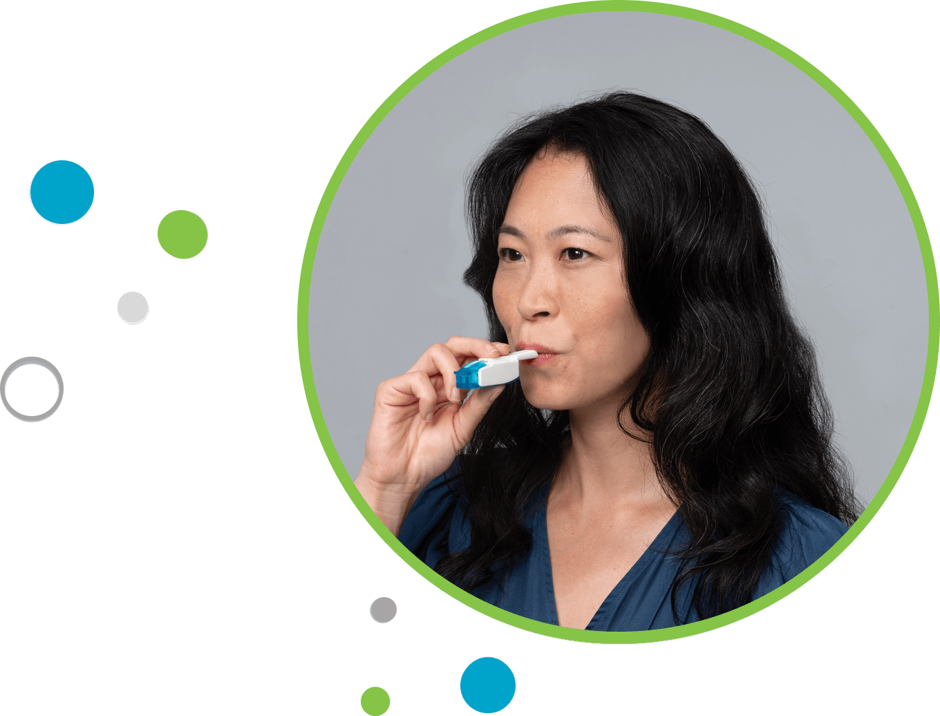 Portrait of woman using the TYVASO Inhalation System.