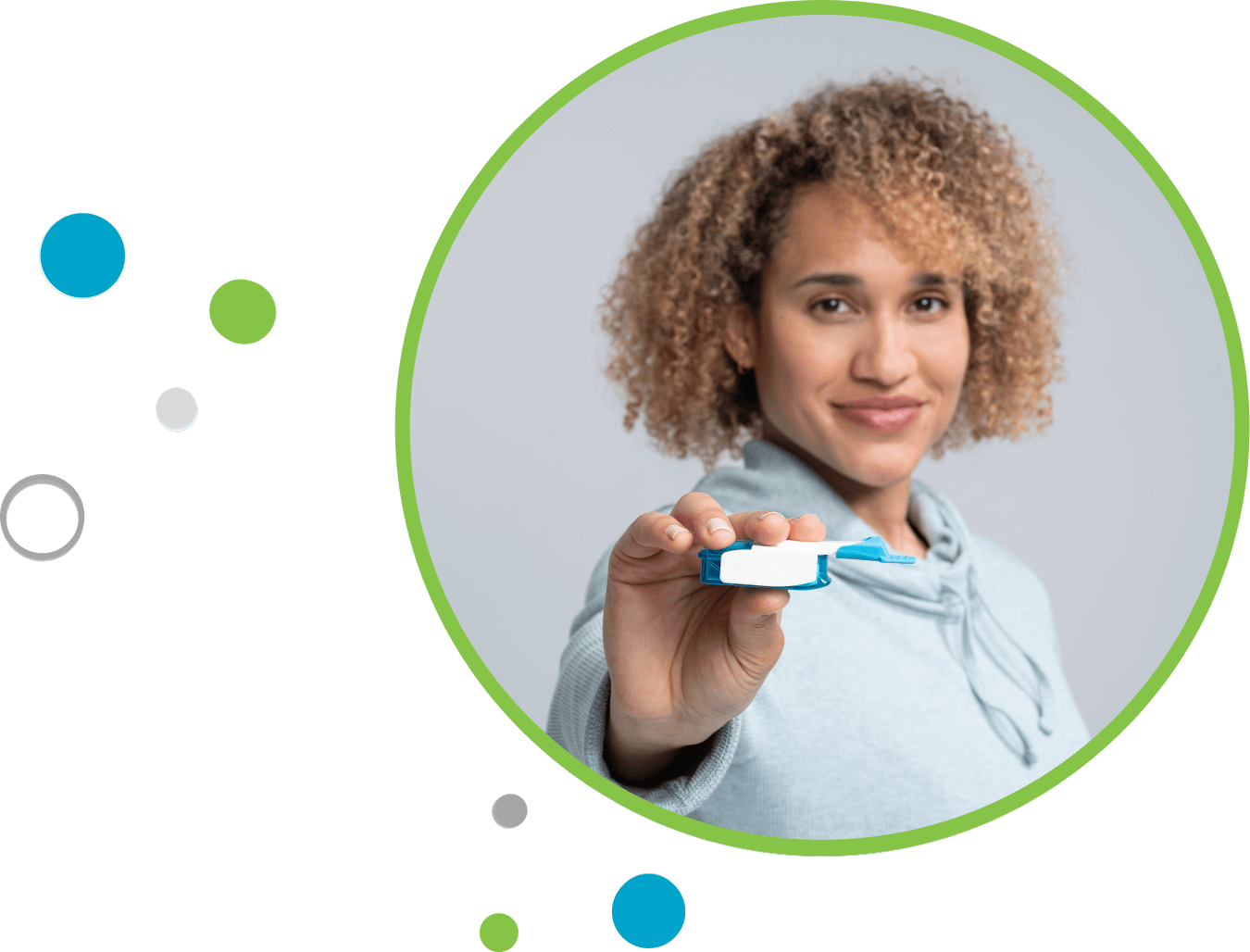 Portrait of woman using the TYVASO Inhalation System