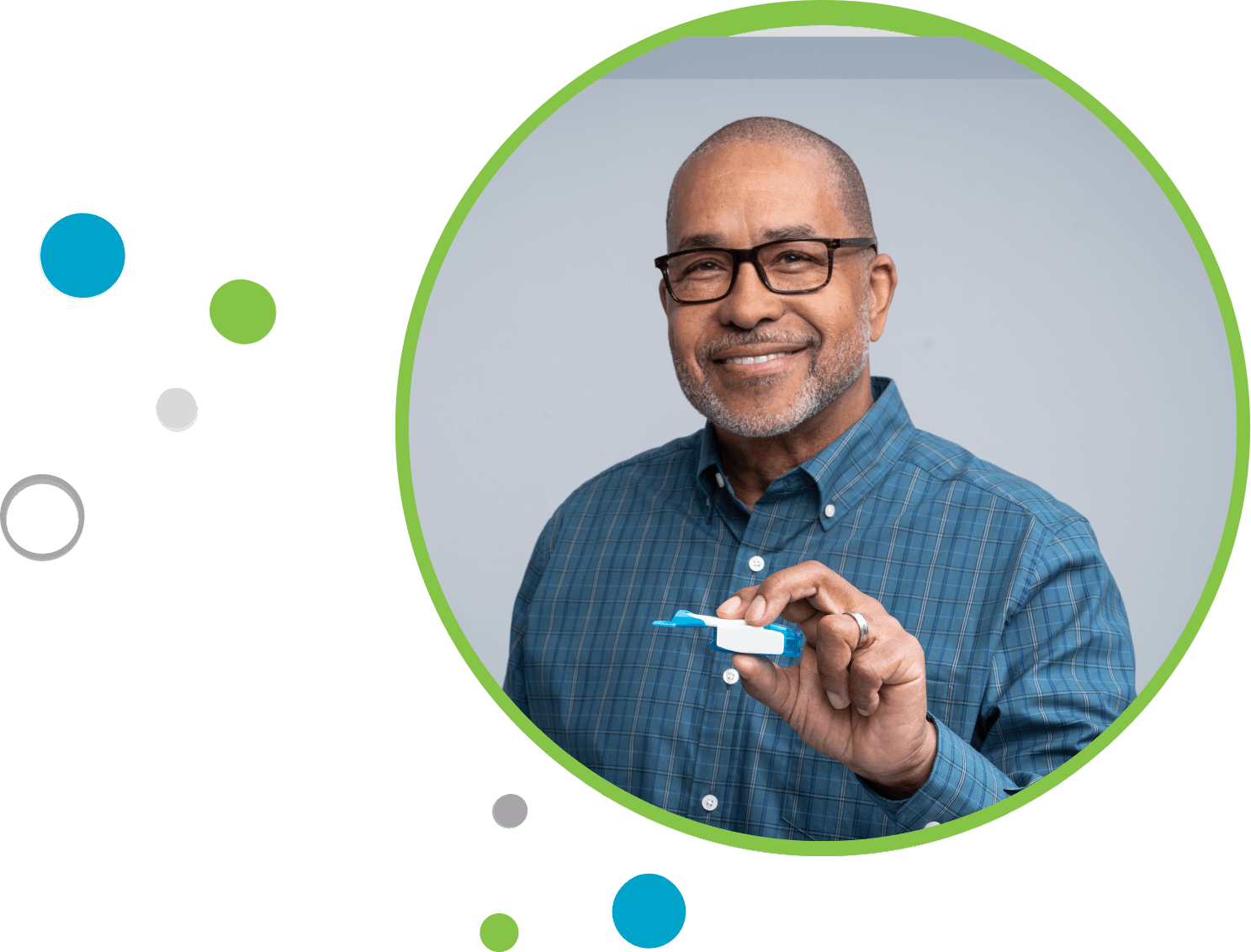 Man holding TYVASO DPI in one hand